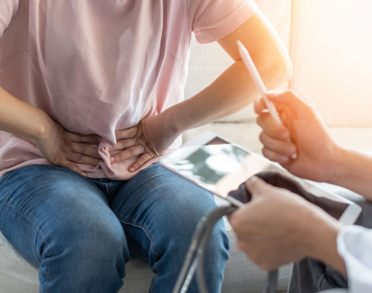 A patient experiencing abdominal pain.